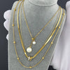 "Necklace with an adjustable chain, showcasing its durable gold-plated finish."