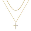 Flat lay of a gold-plated necklace with cubic zirconia and other matching jewelry pieces.