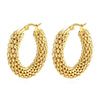 Close-up of elegant gold-plated earrings with hypoallergenic and tarnish-resistant features."