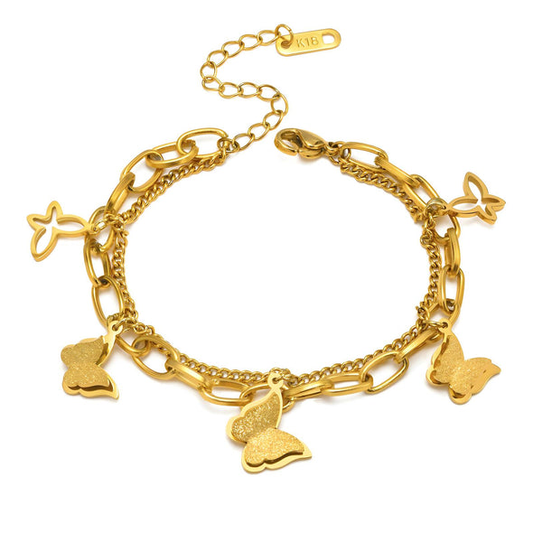 Gold-plated bracelet with cubic zirconia accents displayed on a white background.