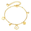 Minimalist gold-plated bracelet styled alongside casual summer accessories."