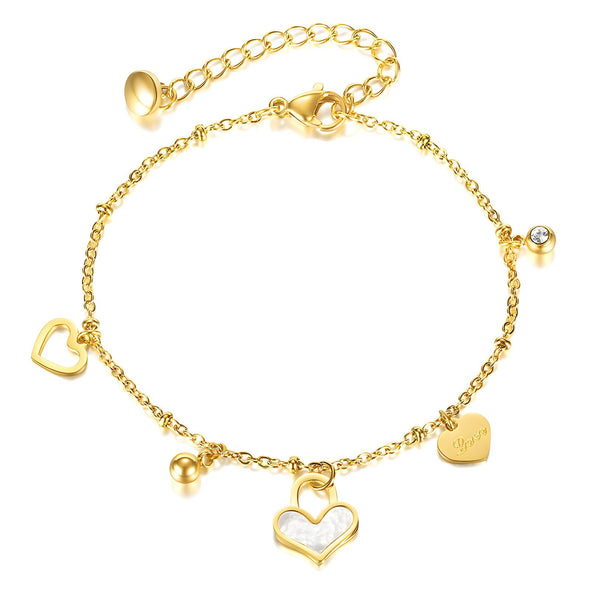 Minimalist gold-plated bracelet styled alongside casual summer accessories."