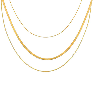 Close-up of a necklace pendant’s intricate detailing and durable gold-plated finish.